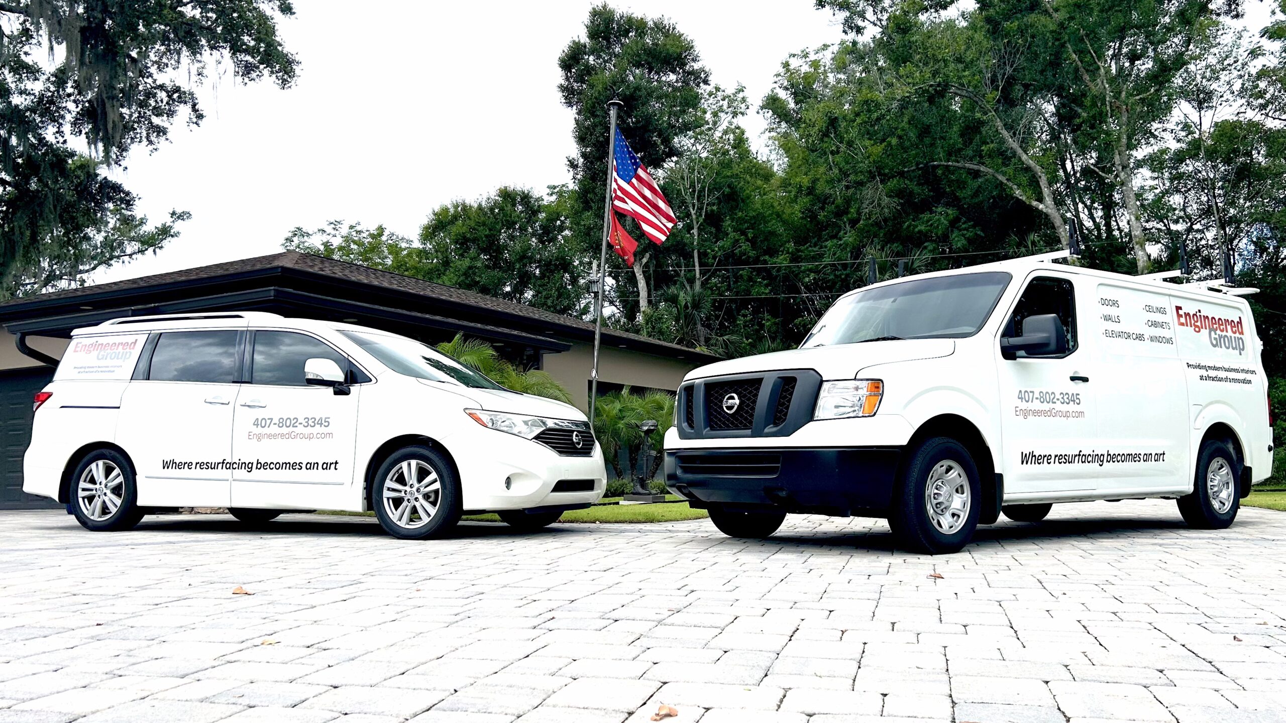 image displays two company vehicles belonging to Engineered Group