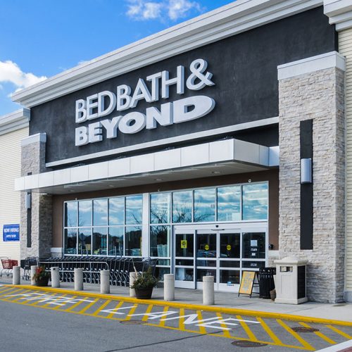 The front glass entrance of the Bed Bath & Beyond store